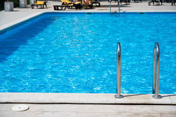 Outdoor pool railings with clear water