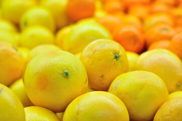 Ripe yellow grapefruit at vegetable market