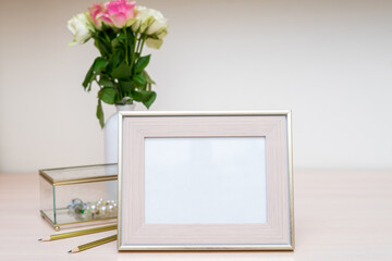 Portrait white with gold picture frame mockup and jewelry box