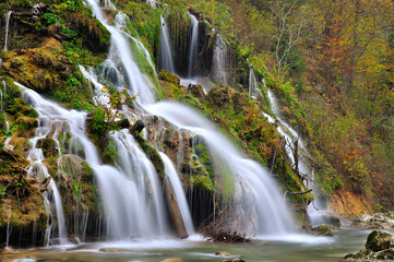 Mountain waterfall in autumn.