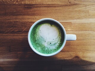 Cup with matcha latte