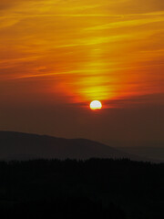 Bright orange-red sky during a sunset