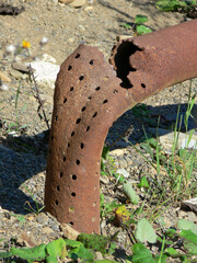 Rusted pipe in the countryside