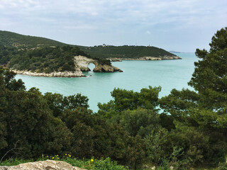 Beautiful natural rock formation Arc of San Felice on Gargano coast, Italy