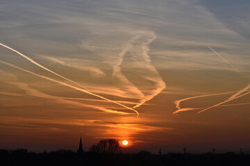 contrails at sunset