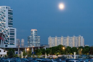 Moon on the evening sky over the Moscow city