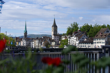 Fototapeta na wymiar Old town of City of Zurich with river Limmat at Springtime with medieval buildings and churches. Photo taken May 26th, 2021, Zurich, Switzerland.
