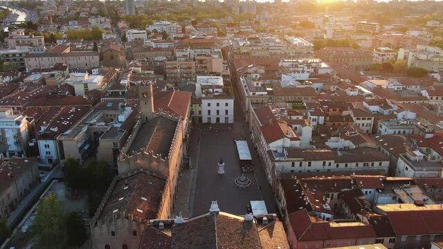 rimini historic city centre aerial shot,drone flying above old town and  cavour square at sunrise dawn bird's eye view