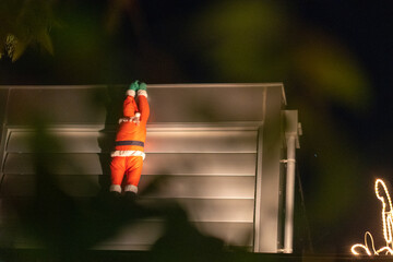 Christmas Santa Claus Secretly Climbing House