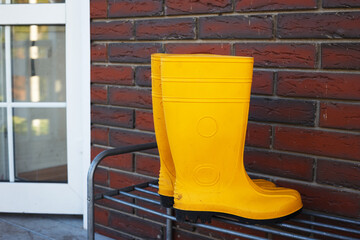 rubber boots near the entrance to the house