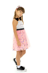 Portrait of pretty girl in stylish clothes