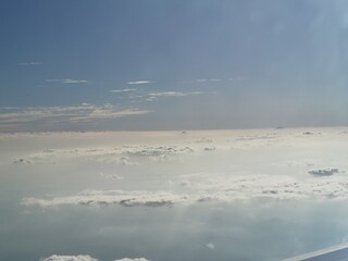 Overlooking the sea of clouds on the plane. Flight to Singapore.