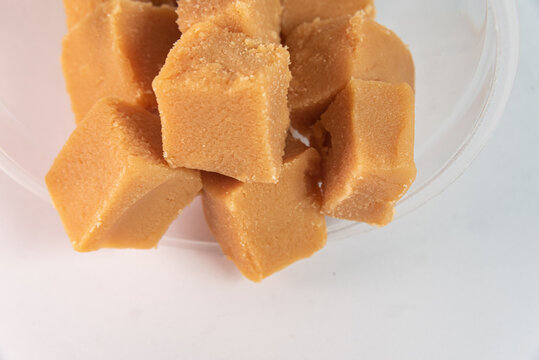 Cubes Of Dulce De Leche On The White Background