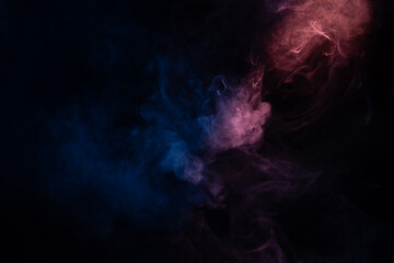 Blue and pink steam on a black background.