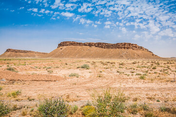 Landscape view on nature between Erfoud and El Jorf with huge stone hill