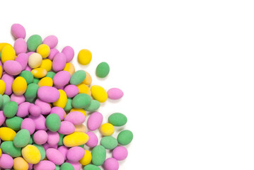 Group of colorful peanuts in glaze.