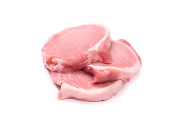 Raw pork pieces isolated on a white background.