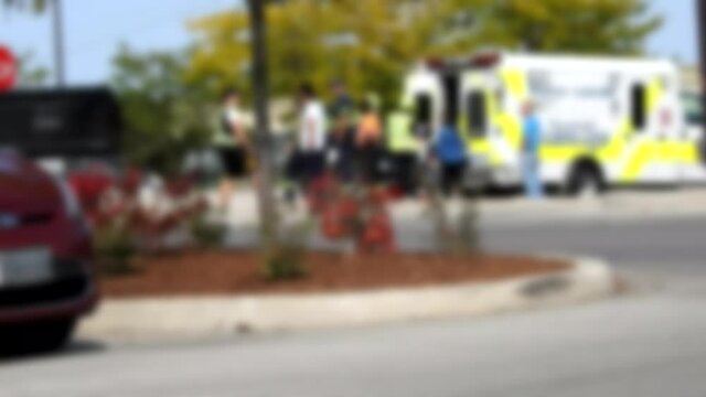 Wide Angle Paramedics Police Officers At Scene Of Crash Saving Person