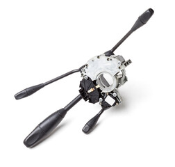 Steering wheel switches for windshield wipers and turn signals with steering angle sensor disassembled on a white isolated background, spare part for car repair or for sale at junk yard.