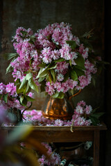 Beautiful bouquet pink flowers. lilac flowers. cherry flowers in vase .