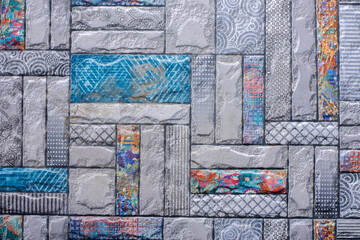 Multicolored wall tile as background.