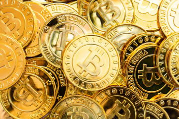 Fototapeta na wymiar Bitcoin cryptocurrency background. A bunch of golden bitcoin, Digital currency