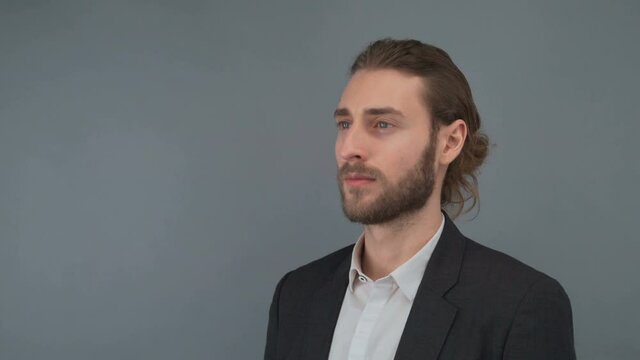 Portrait of his he nice-looking attractive lovely masculine bearded guy folded arms isolated over light gray pastel background