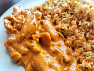 Indian chicken curry with egg fried rice.  