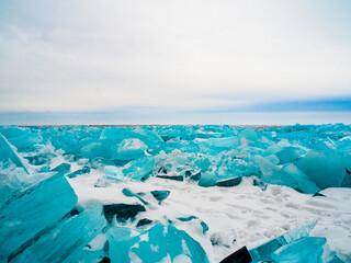 Fototapeta na wymiar Beautiful transparent ice of winter lake