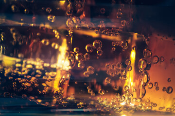 Refreshing Bubbly Soda Pop with Ice Cubes. Cold soda iced drink in a glasses - Selective focus,...
