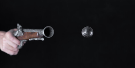 flying ancient bullet, antique cannonball