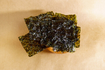 Crispy nori seaweed close up. Japanese food nori. Dry seaweed sheets.