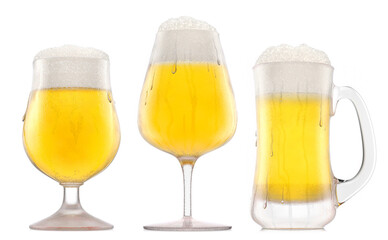 Set of fresh beer in different mugs with bubble froth isolated on white.