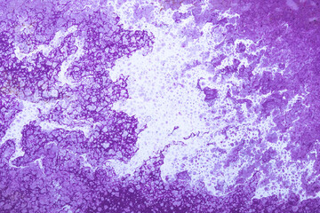 Purple painted background, paint, abstract violet pattern, magenta texture, liquid ink. Modern wash drawing, painting. Stained surface,  grunge texture. Creative wallpaper, beautiful design.