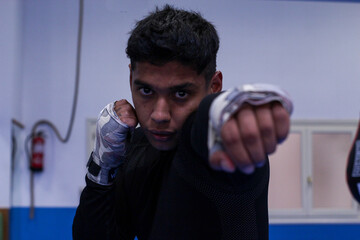 Latin boxer training in the gym