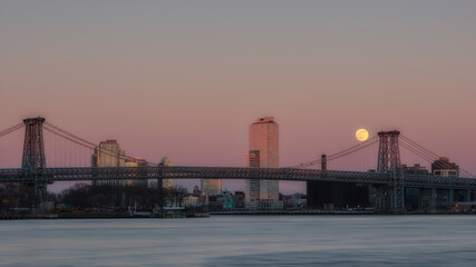 Williamsburg bridge with a full moonrise