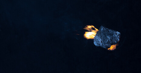 flying asteroid meteorite in black space