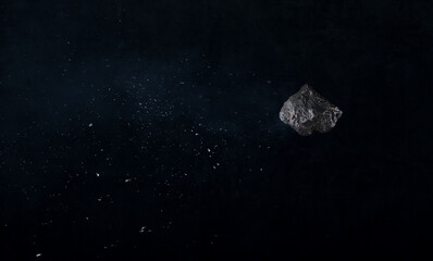 flying asteroid meteorite in black space