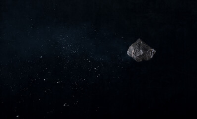 flying asteroid meteorite in black space