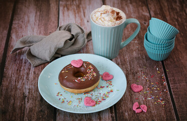 doughnut with  a heart and a cup of coffee