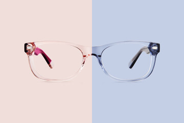 pink and blue transparent plastic color eye glasses isolated on background, ideal photo template...