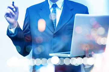 Business man action against candle stick graph chart of stock market investment trading, monotone...