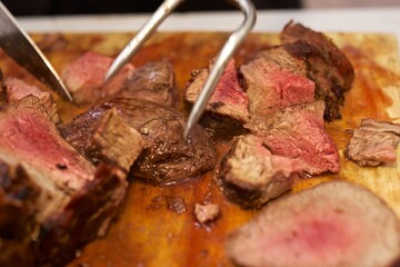 Lomito Carne Asada preparing and cutting tenderloin steak medium rare 