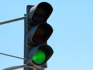 Traffic light green. Traffic control on roads.
