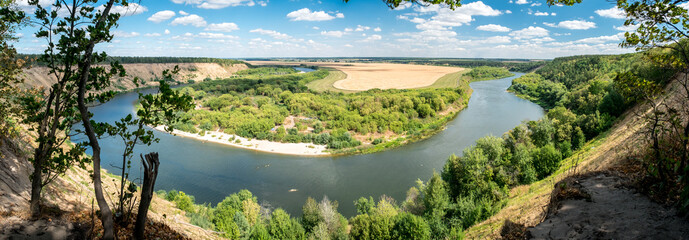 Fototapeta na wymiar Summer landscape with beautiful river Don, high sand hills and forest. Krivoborie in Voronezh Region, Russia
