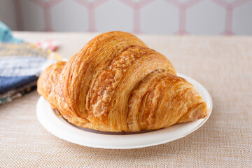A closeup view of a croissant.