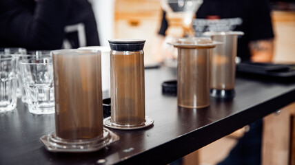 Alternative method of making coffee, aeropress drip glasses with paper filter kettle hot water