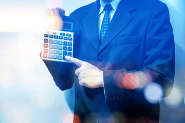 Business man action against candle stick graph chart of stock market investment trading, monotone...