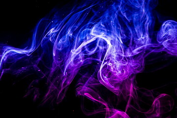 Colored smoke on black background