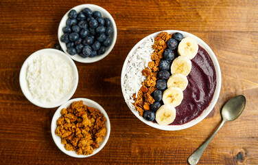 Blueberry smoothie bowl with granola and fresh fruit